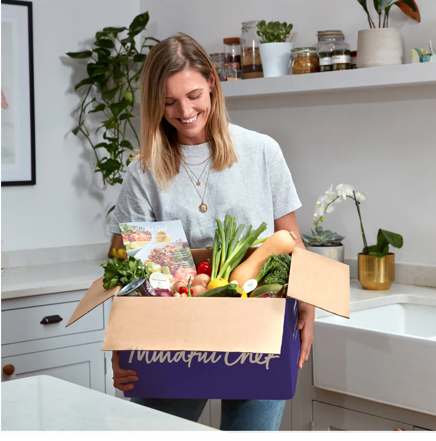 Women helding Mindful Chef Subscription Box